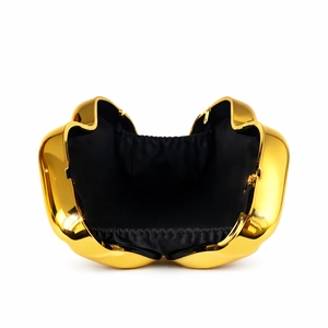 Modern gold metallic wave-edge clutch bag with high-gloss finish and black lining