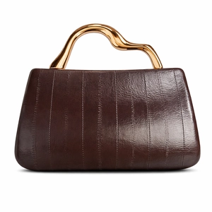 Detail of dark brown textured leather bag with wavy gold metal handle in minimalist style