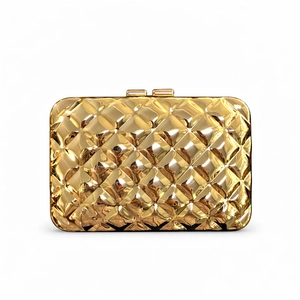 Detailed view of golden metallic evening clutch with diamond lattice embossed texture