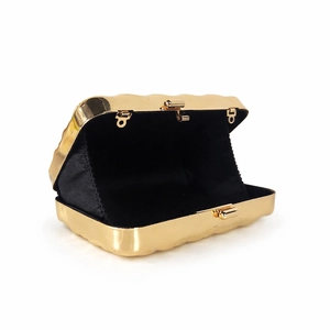 Elegant gold wavy shell clutch bag with black interior lining and metallic clasp for evening