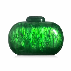 Close-up of green marble acrylic clutch bag with polished resin texture and metal clasp