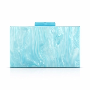 Detail of blue and white marble pattern acrylic evening clutch with dual rectangular clasp