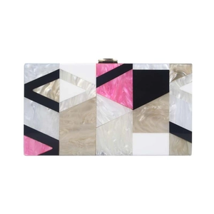 Front view of geometric acrylic evening clutch with colorful patchwork and gold metal clasp