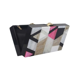 Chic acrylic evening clutch with geometric marble patterns and gold metal clasp