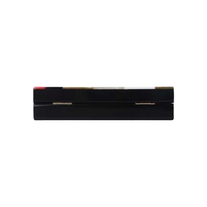 Detail view of the gold metal hinges on a multi-colored acrylic evening clutch bag