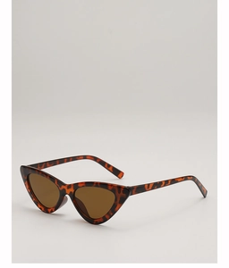 Detailed top view of retro cat-eye sunglasses with tortoise frame and brown lenses