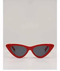 Front view of vintage cat-eye sunglasses with glossy red frames and dark polarized lenses