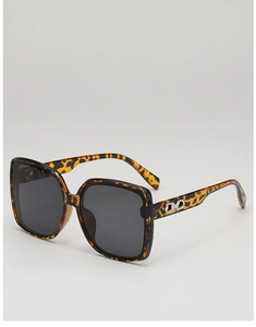 Detail of tortoise shell square sunglasses with silver infinity metal hinge accents