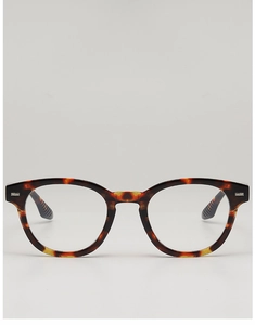 Detail of tortoise shell acetate frame featuring reinforced hinges and anti-slip temples