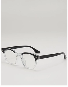 Detail of retro round glasses frame with black and transparent two-tone panel design