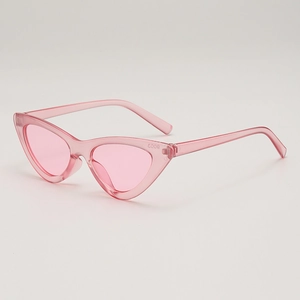 Retro cat eye sunglasses in translucent pink with triangular fashion frame design