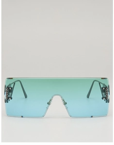 Detail of rimless shield sunglasses with mint green gradient lens and hollow metal temples
