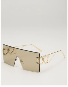 Detail of rimless square sunglasses with gold temples and double heart hollow design