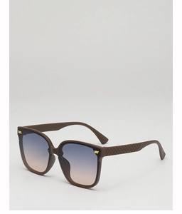 Close-up of brown square frames with quilted texture temples and gradient lenses