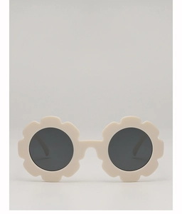 Vue détaillée de lunettes de soleil fleurs pour enfants en blanc crème avec verres noirs