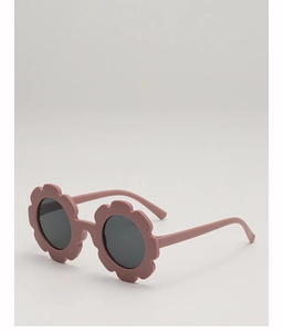 Détail de lunettes de soleil fleurs roses mates pour enfants avec verres foncés