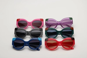 Detailed grid of cat-eye sunglasses in six various vibrant color combinations
