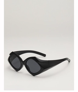 Close-up of hip-hop style black geometric sunglasses with wide temple structure