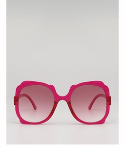 Macro view of fashionable pink gradient oversized sunglasses with durable resin frame
