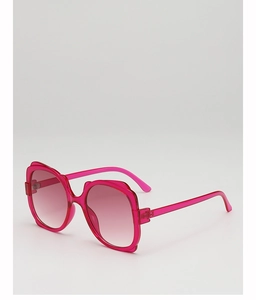 Detailed side view of pink oversized sunglasses with transparent resin frames and gradient lenses