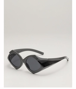 Detail view of bold geometric sunglasses with thick temples and dark grey lenses