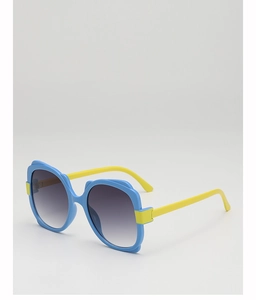 Detail view of sky blue sunglasses frame with contrasting yellow temples and gradient lenses