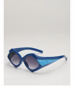 Close-up of geometric square sunglasses with blue color-blocking and gradient lenses