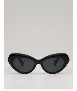 Detailed view of polished black cat-eye sunglasses with premium glossy frame finish