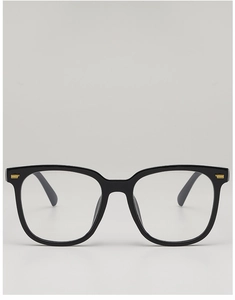 Detail of black square frames with golden horizontal metal studs on the front hinges
