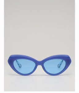 Detail view of vintage cat-eye sunglasses with royal blue frame and blue lenses