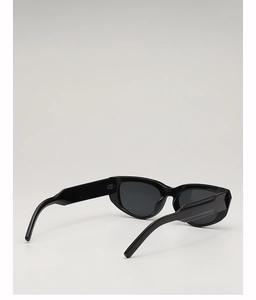 Detail view of stylish black cat eye sunglasses showing thick temple and glossy frame