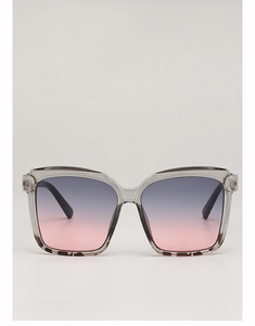 Detail of square gradient sunglasses with transparent grey frame and tortoiseshell accents