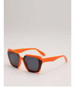 Close-up of vibrant orange geometric thick frame sunglasses with dark lenses