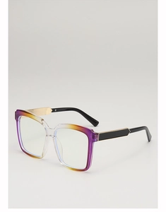Detailed shot of gradient frame sunglasses with golden metal hinges and black temples