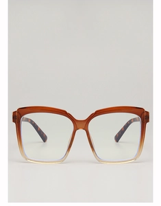 Detailed view of oversized square frames with amber gradient finish and tortoiseshell temples