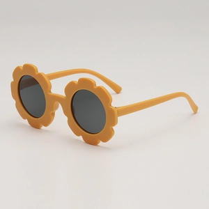 Lunettes de soleil enfant forme tournesol jaune avec monture mate et verres ronds