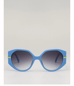 Detail of blue geometric oversized sunglasses with yellow accents and gradient grey lenses