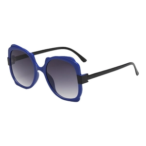 Fashionable oversized blue cat-eye sunglasses with gradient lenses and matte black temples