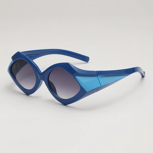Polygonal geometric sunglasses with deep blue frames and gradient lenses in studio view