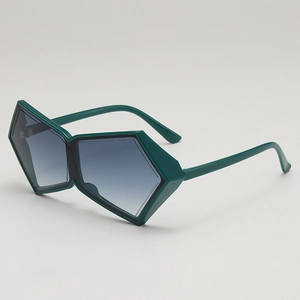 Lunettes de soleil polygonales oversize avec monture vert foncé et verres dégradés bleus