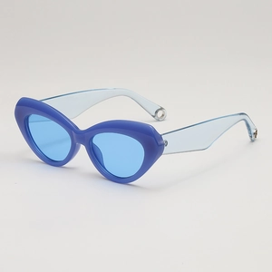 Vintage cat eye sunglasses with thick blue frames and translucent light blue temples