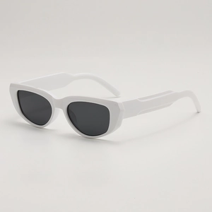 Retro white thick frame cat-eye sunglasses with oval dark lenses in 45-degree side view