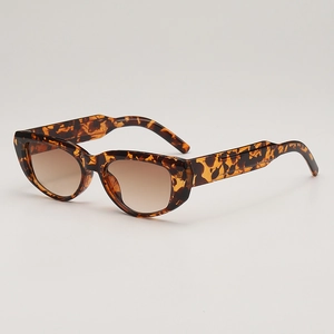 Retro small cat-eye sunglasses with tortoise shell frames and brown gradient lenses