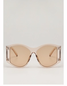 Detail of oversized champagne butterfly frame sunglasses with light brown tinted lenses