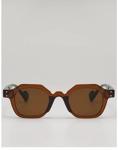 Detailed front view of brown geometric octagonal sunglasses with silver rivet accents