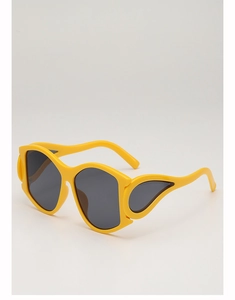 Detail view of bold yellow irregular geometric frame sunglasses with wing decor