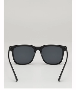 Top view detail of rectangular black sunglasses with dark smoke lenses and smooth finish