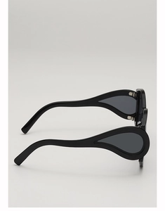 Detail of sleek black sunglasses featuring unique teardrop hollow-out design on temple