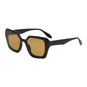 Modern polygonal sunglasses with black frame and amber lenses shown in a 45-degree angle