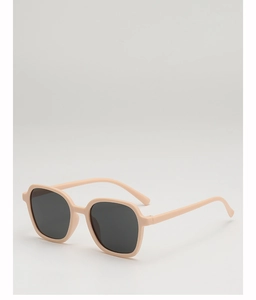 Close-up of children's matte nude square frame sunglasses with dark grey round lenses